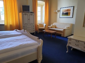 Individually furnished, desk, blackout drapes, rollaway beds