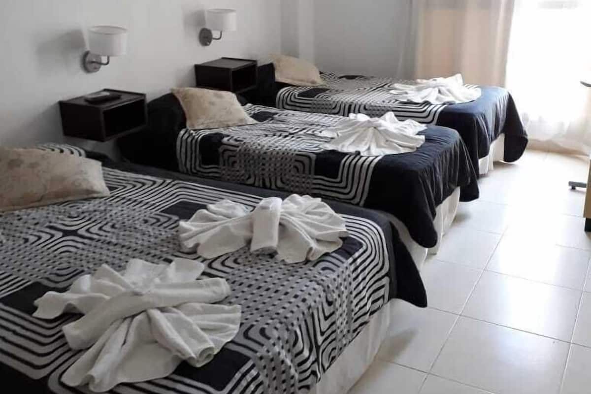 Comfort Quadruple Room, Multiple Beds, Non Smoking, Partial Ocean View | Free WiFi, bed sheets