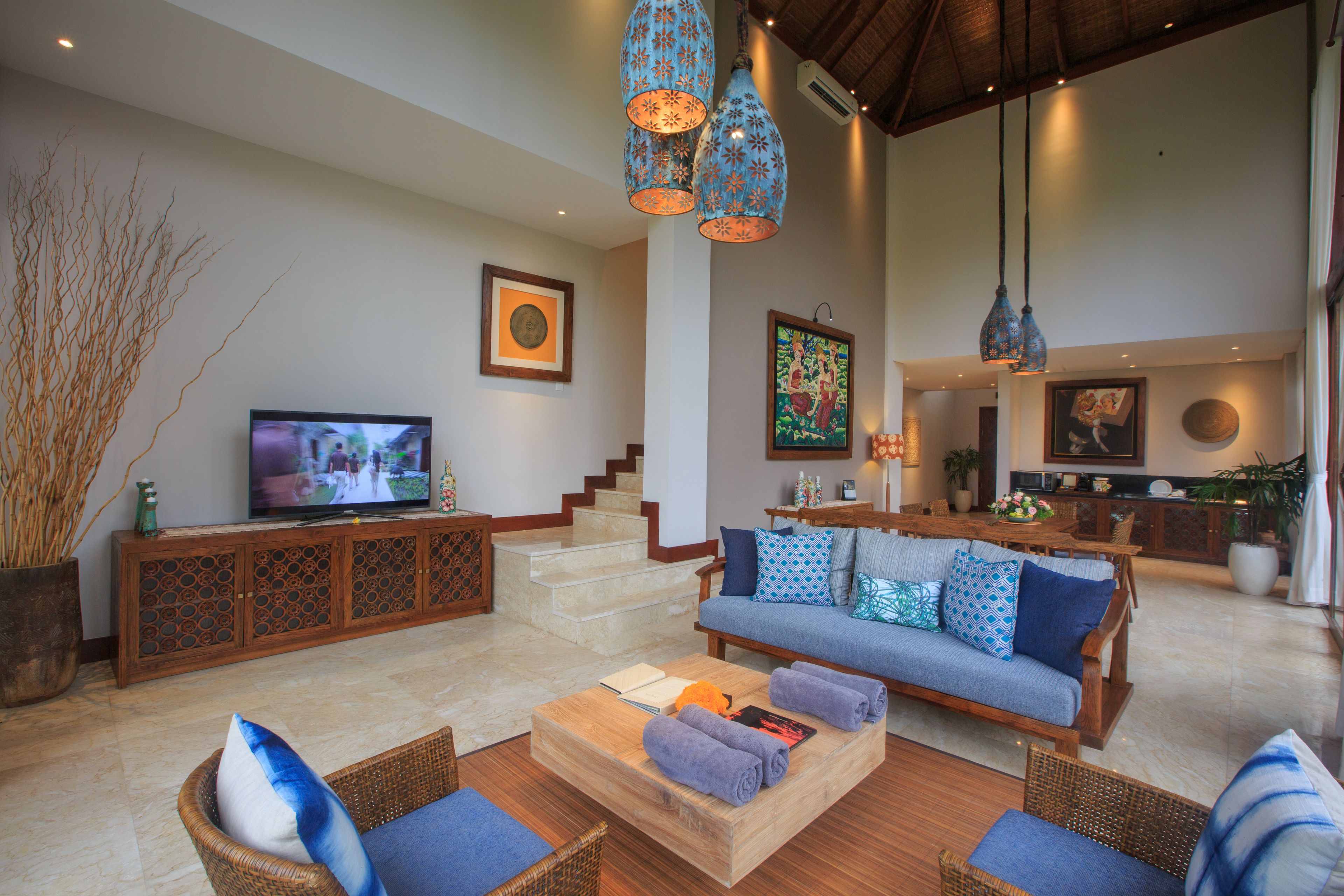 two-bedrooms infinity lap pool villa | living area | flat-screen tv