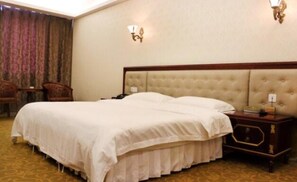 Standard Double or Twin Room | Minibar, in-room safe, desk, blackout drapes