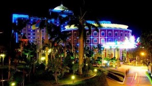 A large, multi-story hotel with a prominent dome and a curved facade. - Lianjiang Libo Hotel (Lianjiang)