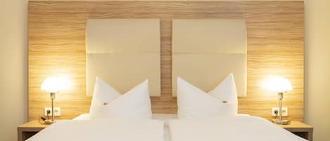 Literie hypoallergénique, coffres-forts dans les chambres, bureau