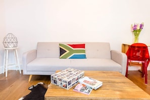 Apartment (1 Bedroom) | Living room | 20-inch TV with digital channels - Beautifully Styled, Modern Apartment With Garden (London)