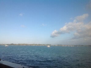 Overlooking the calm sea, this property offers stunning views of the marina and surrounding coastal town.