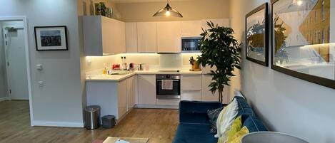 Apartment (1 Bedroom) | Living area | 22-inch TV with digital channels