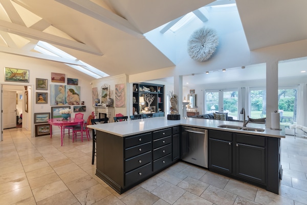 Open living space: dining area and kitchen.