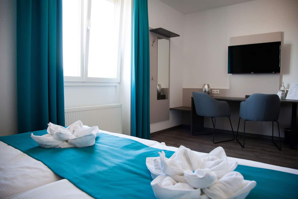 Tweepersoonskamer | Hypoallergeen beddengoed, een bureau, een laptopwerkplek, gratis wifi