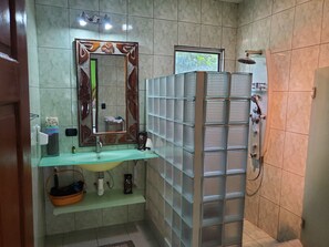 Shower, hair dryer, towels, soap