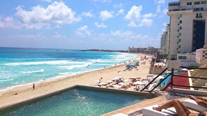 On the beach, sun loungers, beach towels