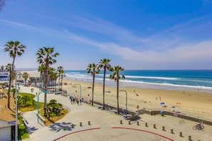 On the beach, sun-loungers, beach towels