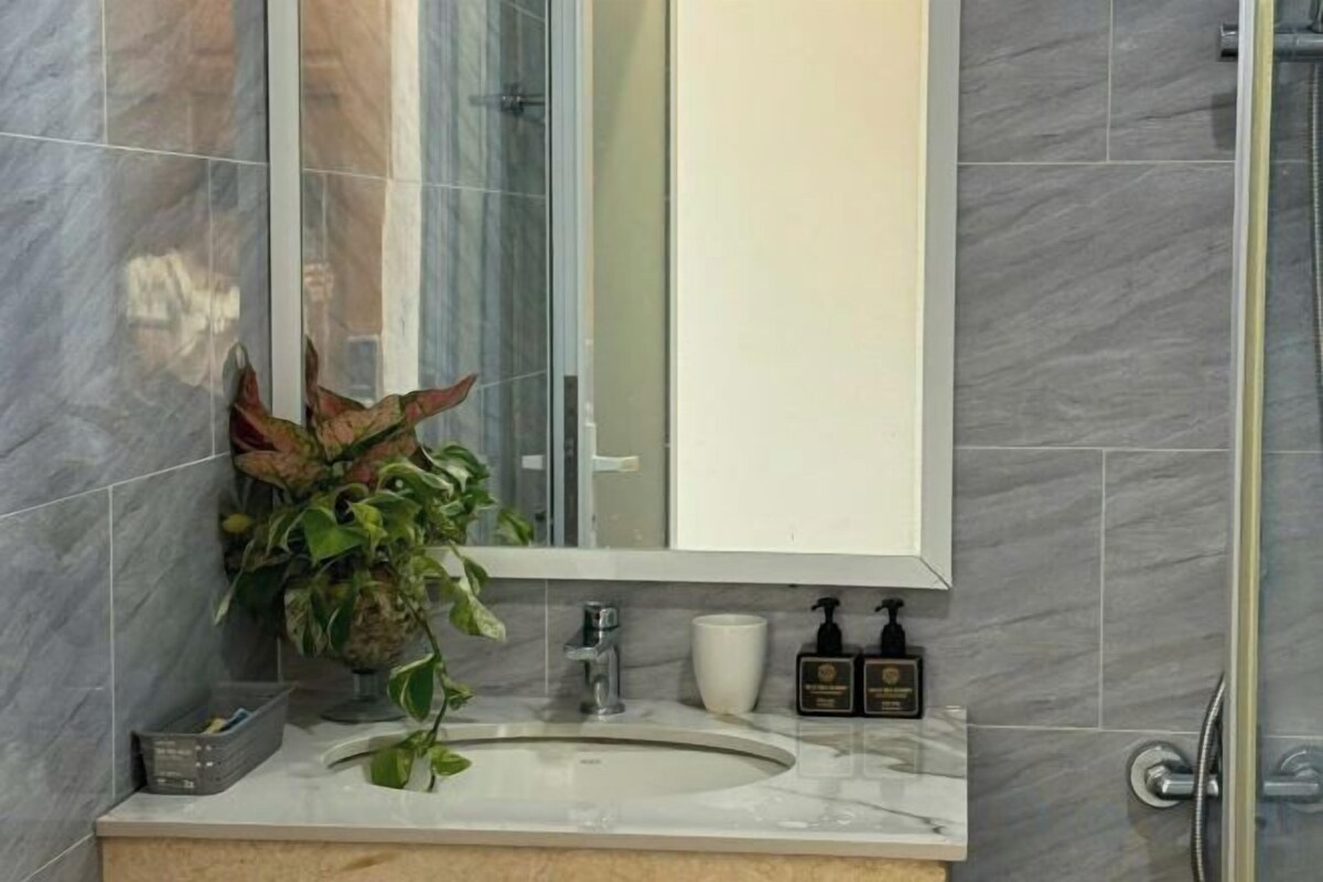 Shower, free toiletries, slippers, towels