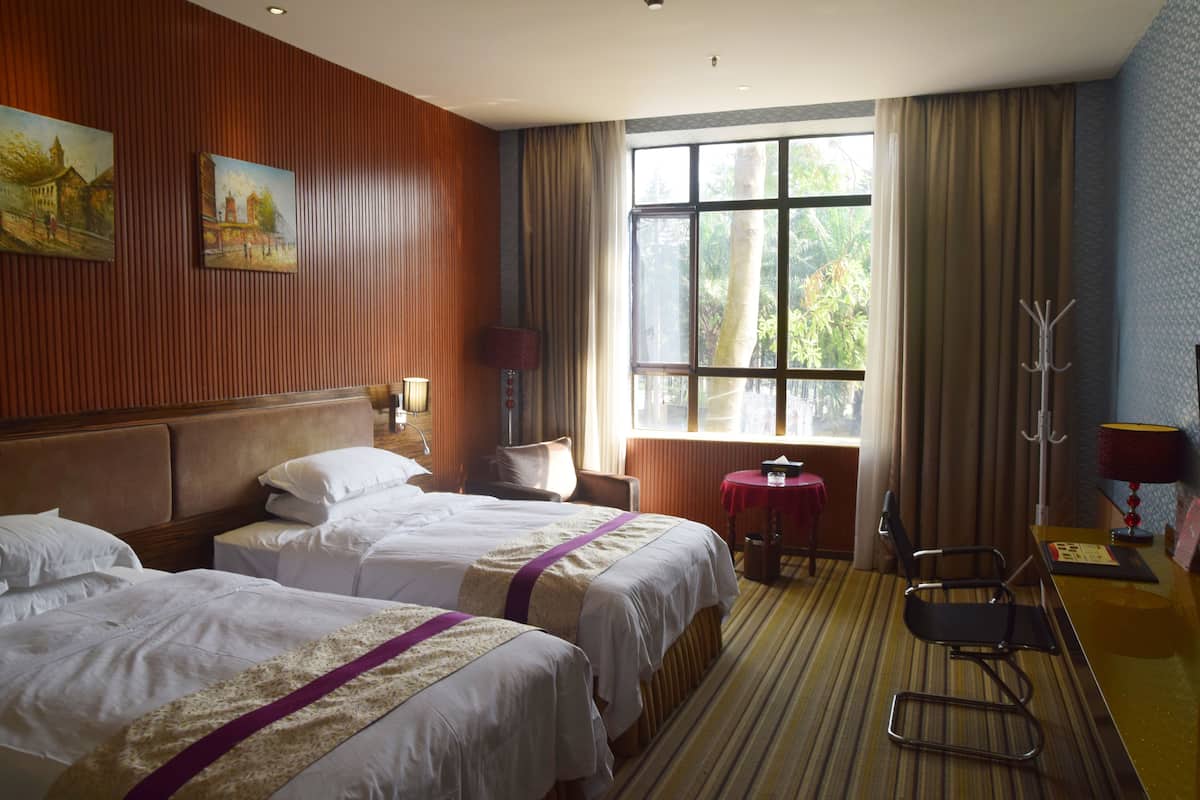 Desk, blackout drapes, iron/ironing board (on request), WiFi (free)
