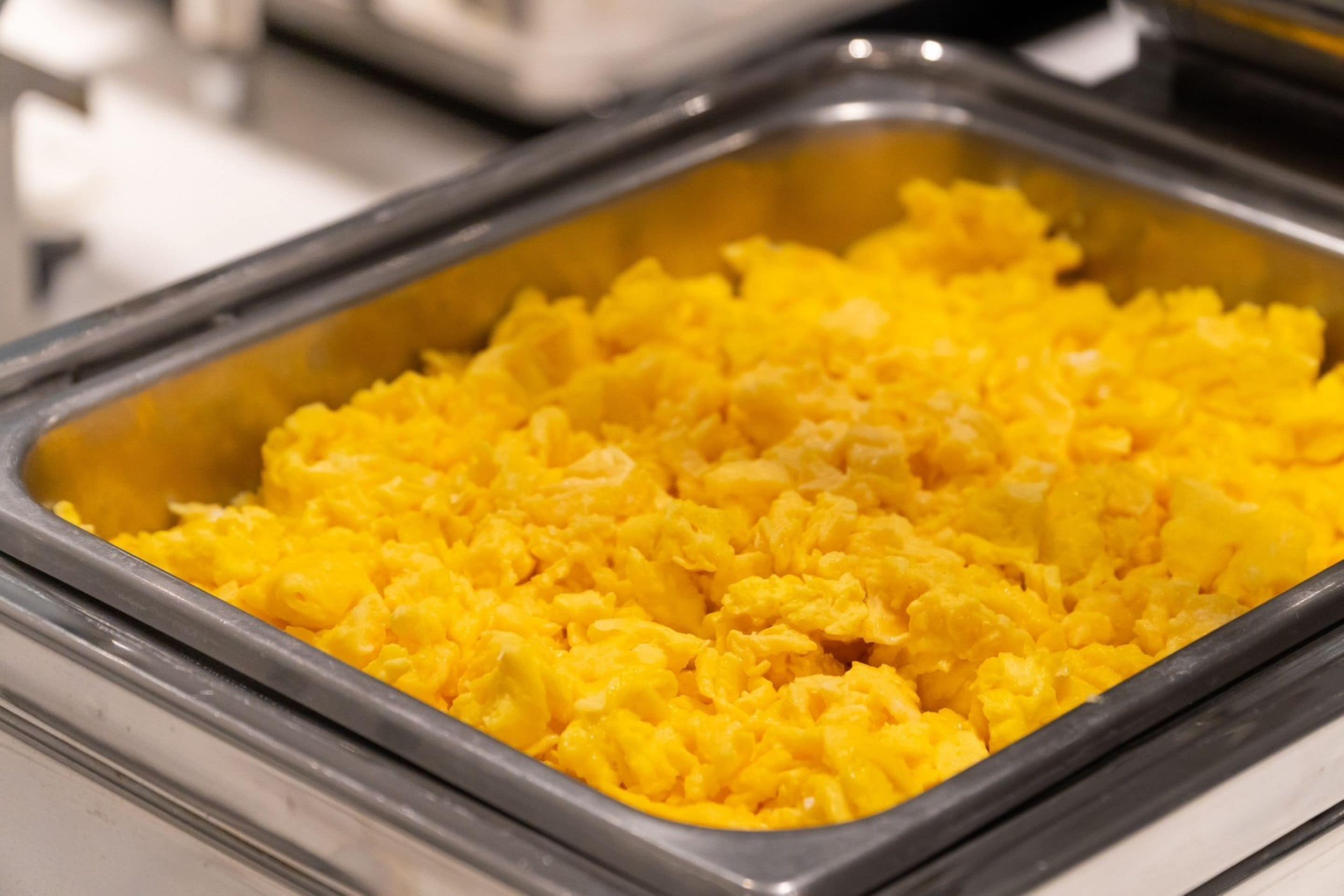 A buffet with scrambled eggs.