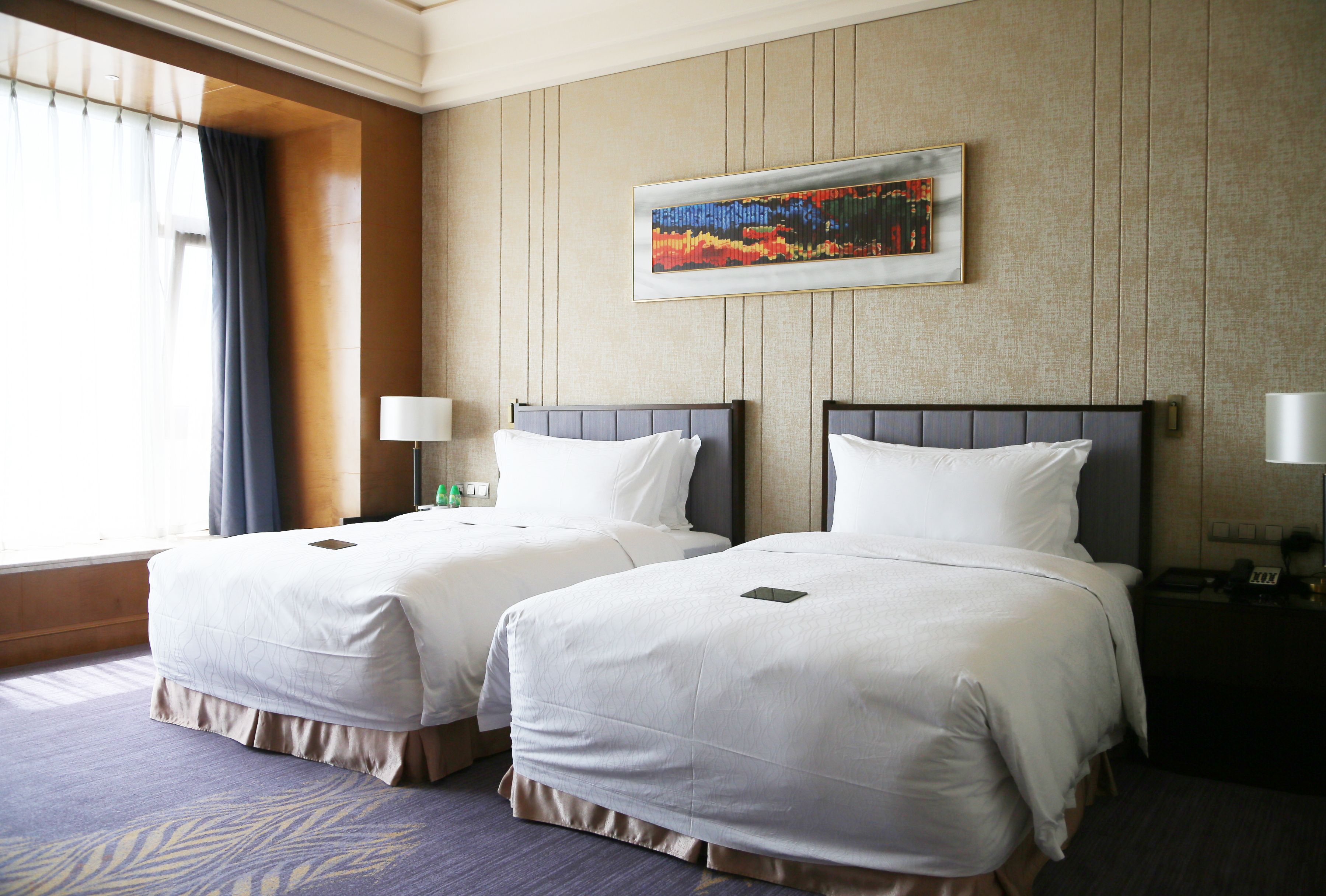 business city view room with twin beds | in-room safe, desk, blackout curtains, iron/ironing board