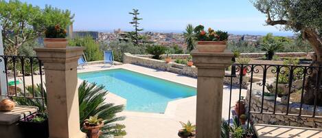 Seasonal outdoor pool, pool umbrellas, sun loungers