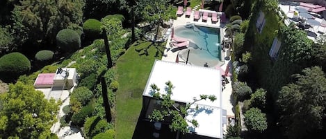 Seasonal outdoor pool, open 8:00 AM to 8:00 PM, pool umbrellas
