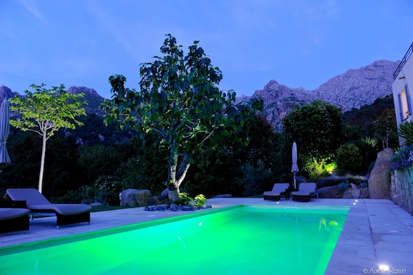 Seasonal outdoor pool, open 8:00 AM to 8:00 PM, pool umbrellas