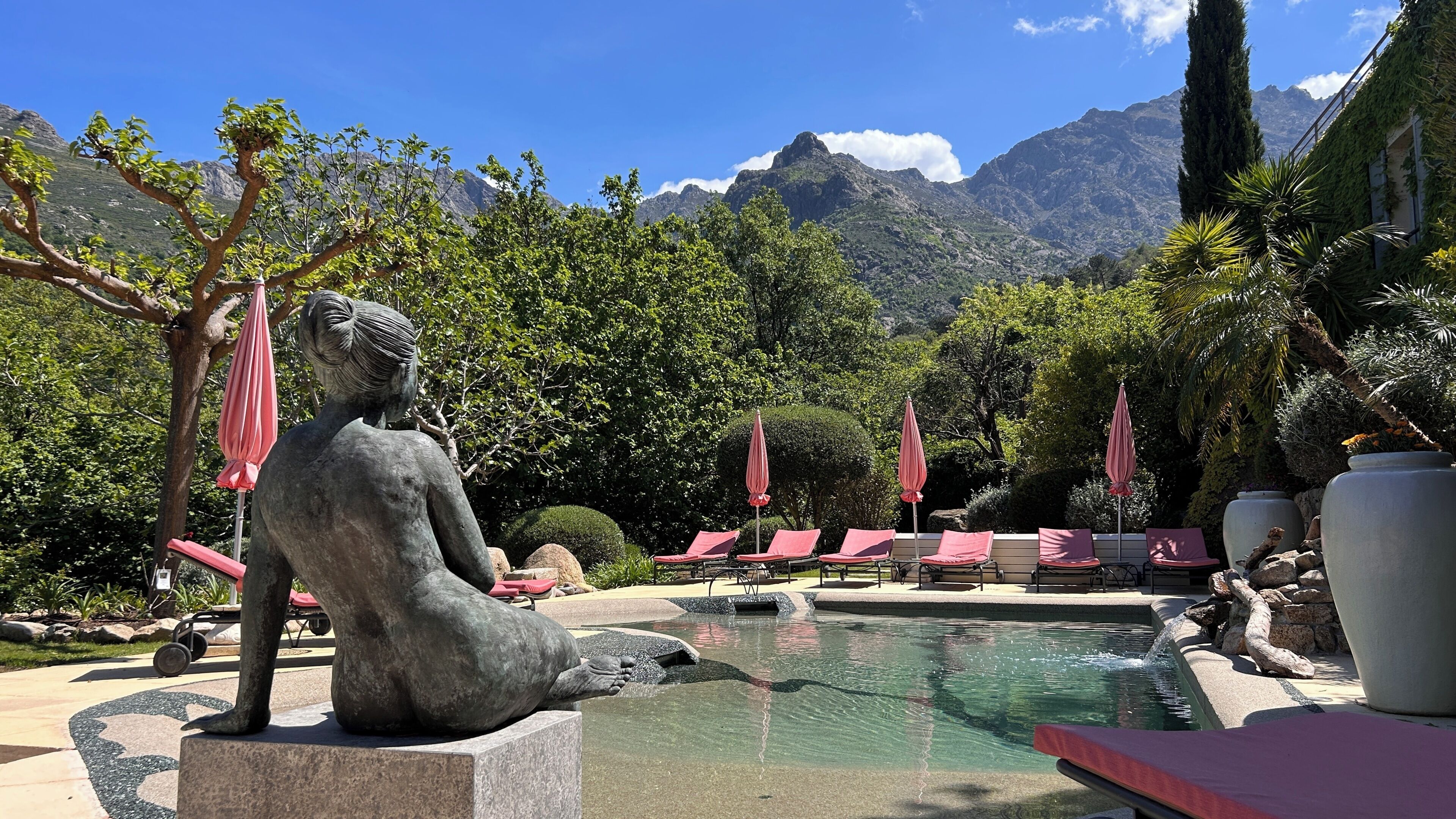 Seasonal outdoor pool, open 8:00 AM to 8:00 PM, pool umbrellas