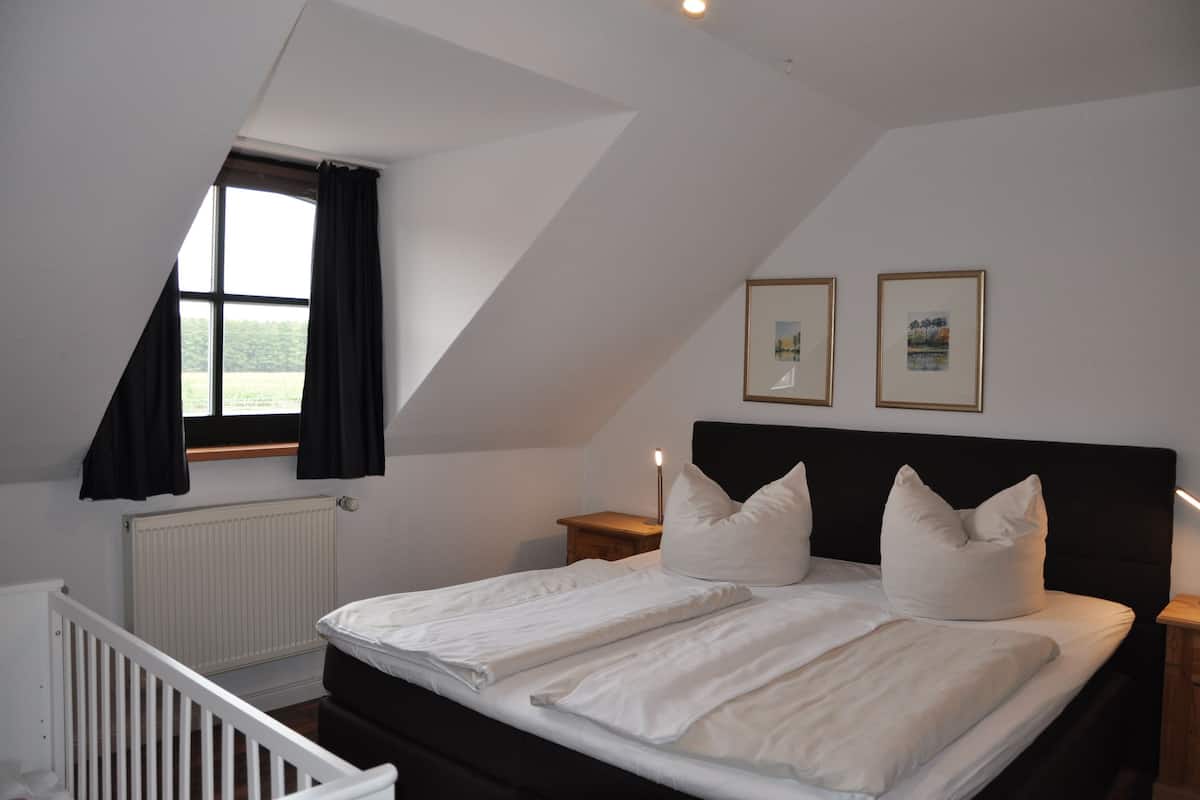Premium bedding, blackout curtains, soundproofing, iron/ironing board