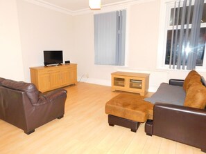 Comfort Apartment, 2 Bedrooms | Living area | Flat-screen TV