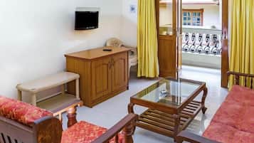 Luxury Apartment, 1 King Bed, Smoking | Living area | 32-inch LCD TV with digital channels, TV