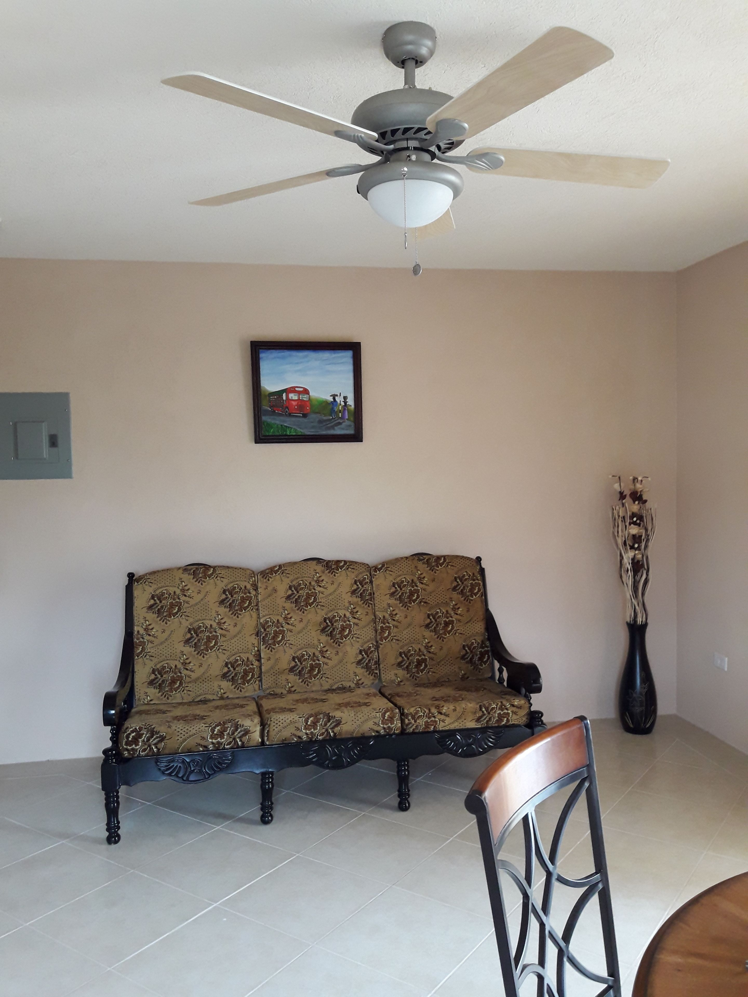 basic apartment, 1 queen bed, non smoking | living area | 40-inch flat-screen tv with cable channels, tv, first-run films