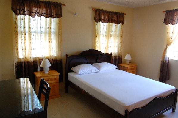 Blackout curtains, iron/ironing board, free WiFi, bed sheets