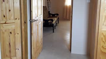 Basic Apartment, 1 Queen Bed, Non Smoking | Living room | 40-inch flat-screen TV with cable channels, TV, first-run movies