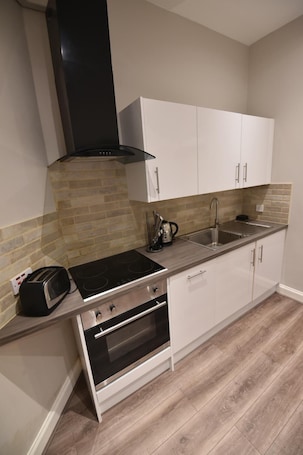 Classic Apartment, 1 King Bed with Sofa bed, Accessible, Garden View | Private kitchen | Full-size fridge, microwave, oven, stovetop