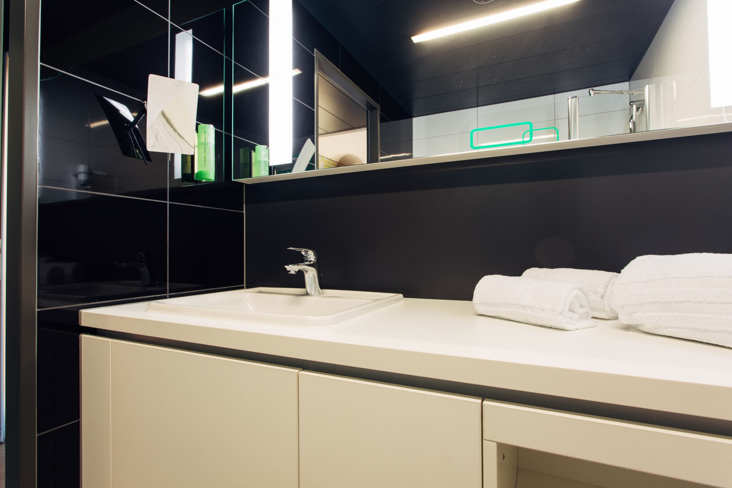 hair dryer, towels, soap, shampoo