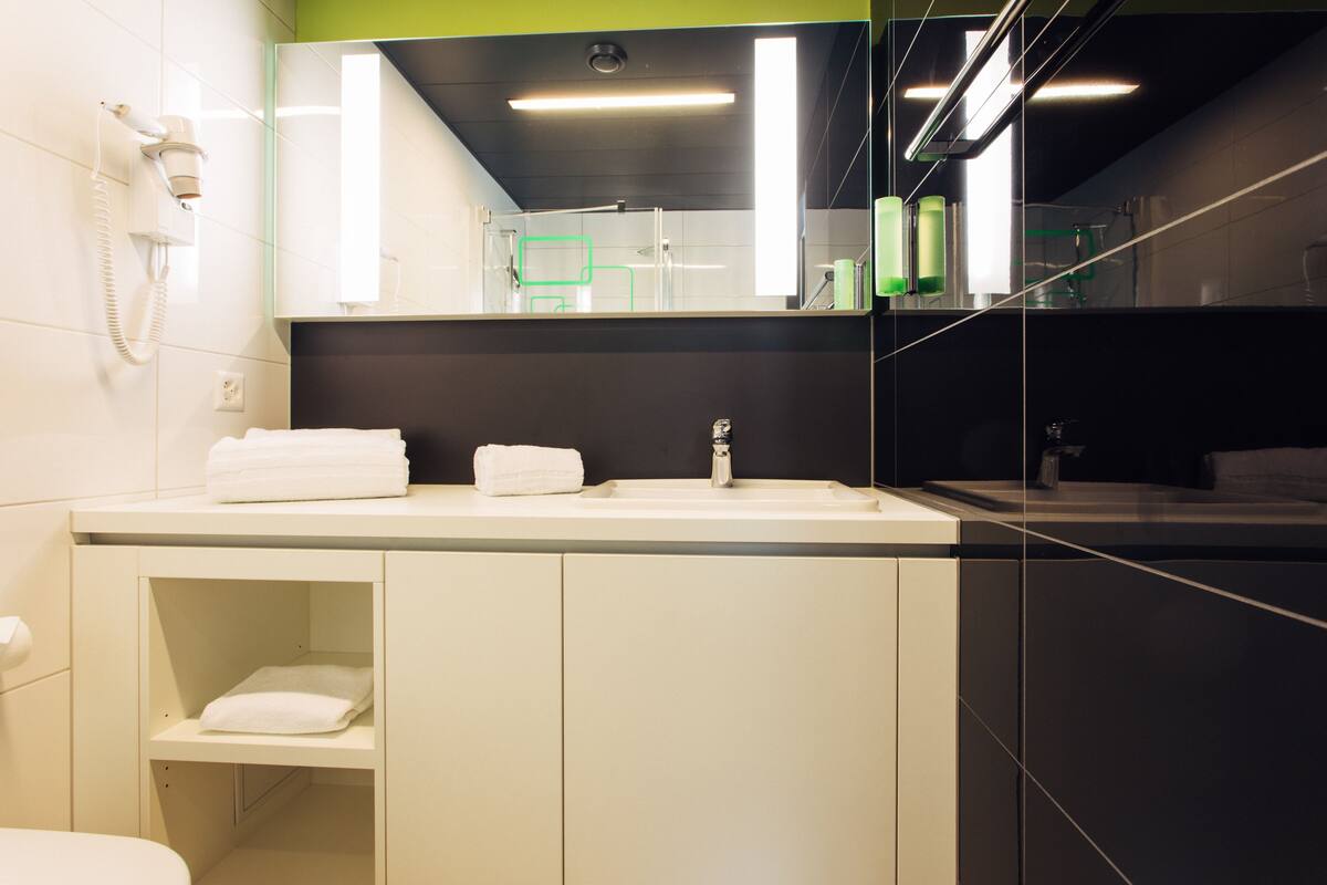 hair dryer, towels, soap, shampoo