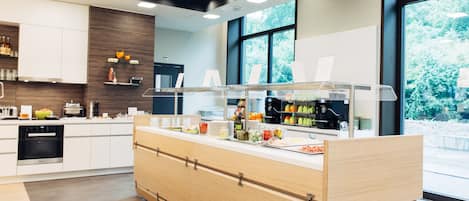Daily buffet breakfast (CHF 23 per person)