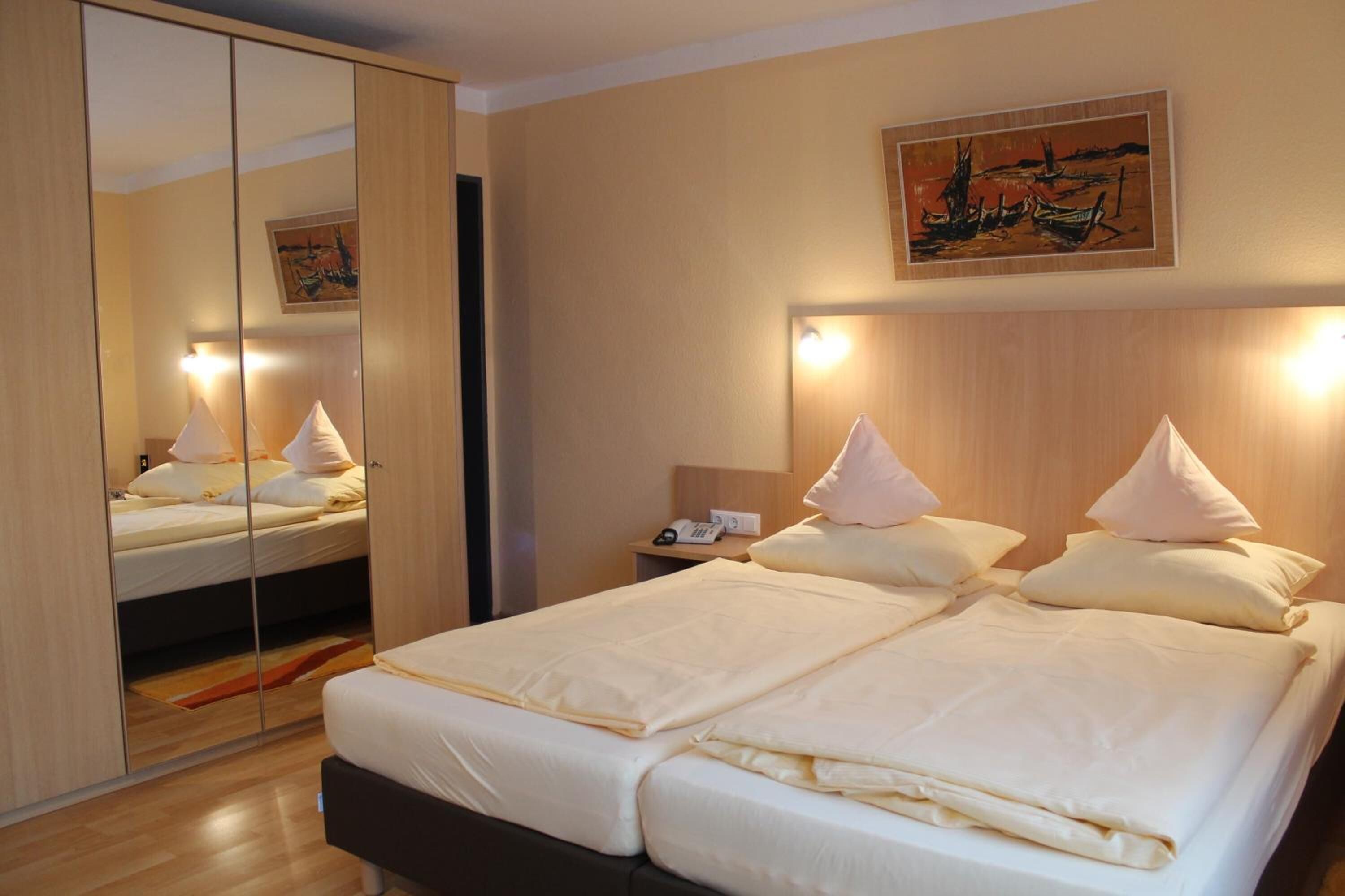 hypo-allergenic bedding, in-room safe, desk, blackout curtains