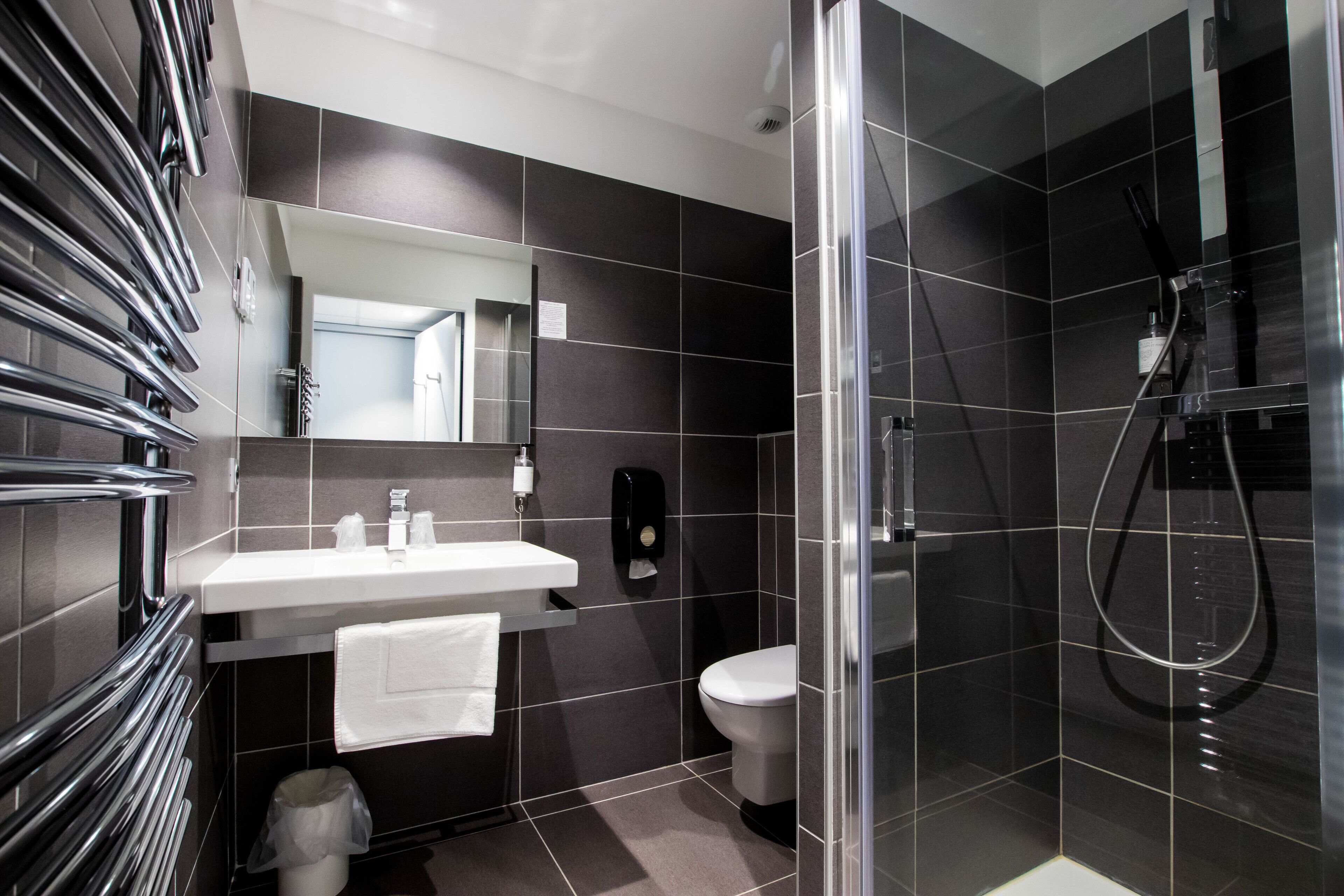 comfort quadruple room | bathroom | shower, hair dryer, towels
