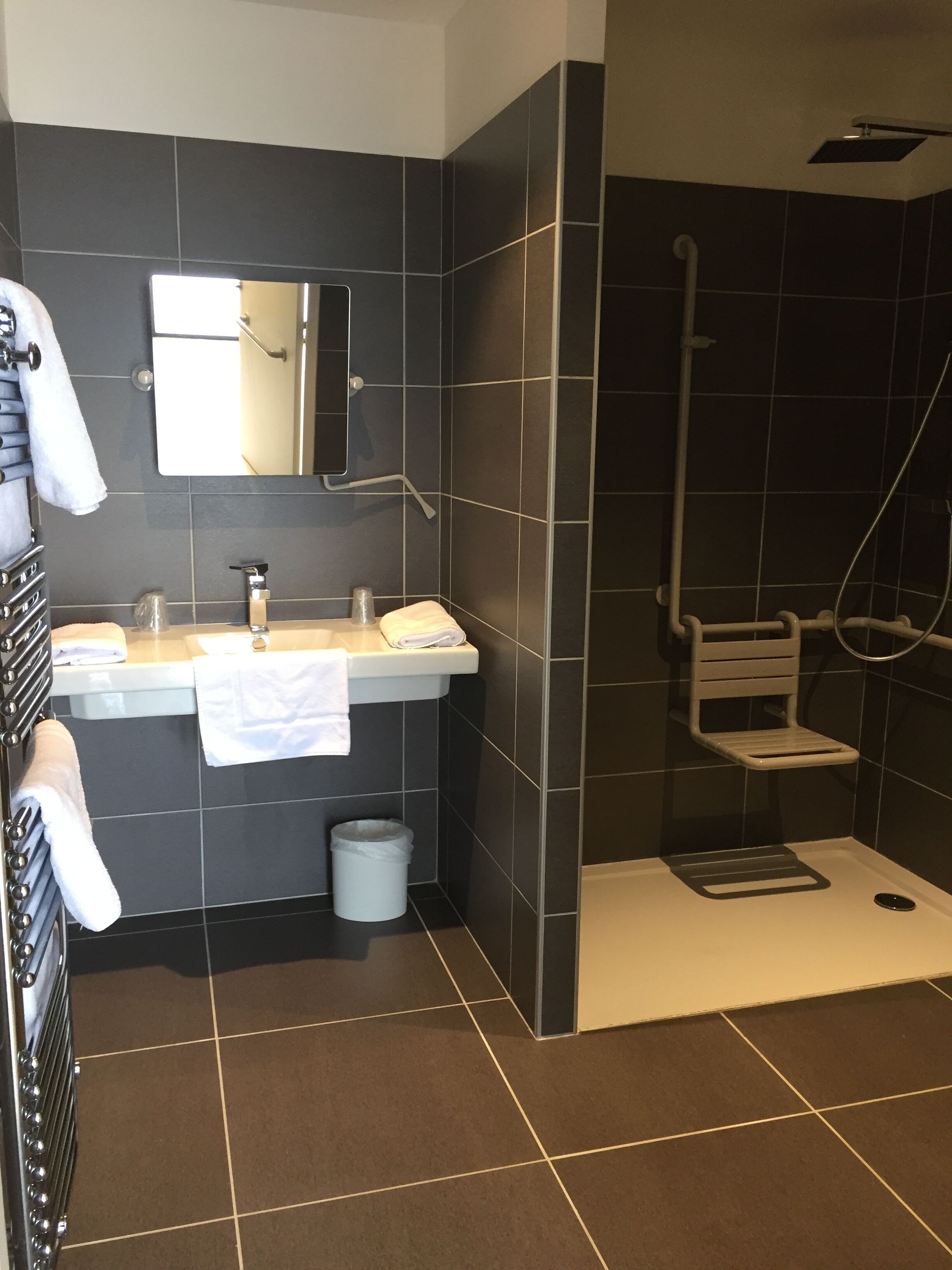 family room | bathroom | shower, hair dryer, towels