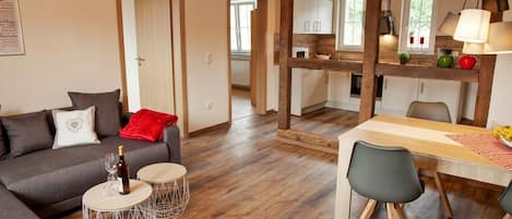 Apartment, Garden View (Froschkönig) | Living area | Flat-screen TV, toys