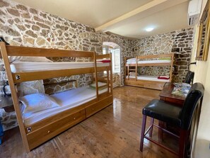 A room with bunk beds, a wooden desk, and a chair. - Tequila Bar Hostel - Adults Only (Zadar)