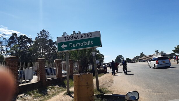 A sign for Tarisa Road pointing to Damofalls. - Nhaka Savaal (Ruwa)