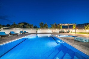 Outdoor pool, pool umbrellas, pool loungers