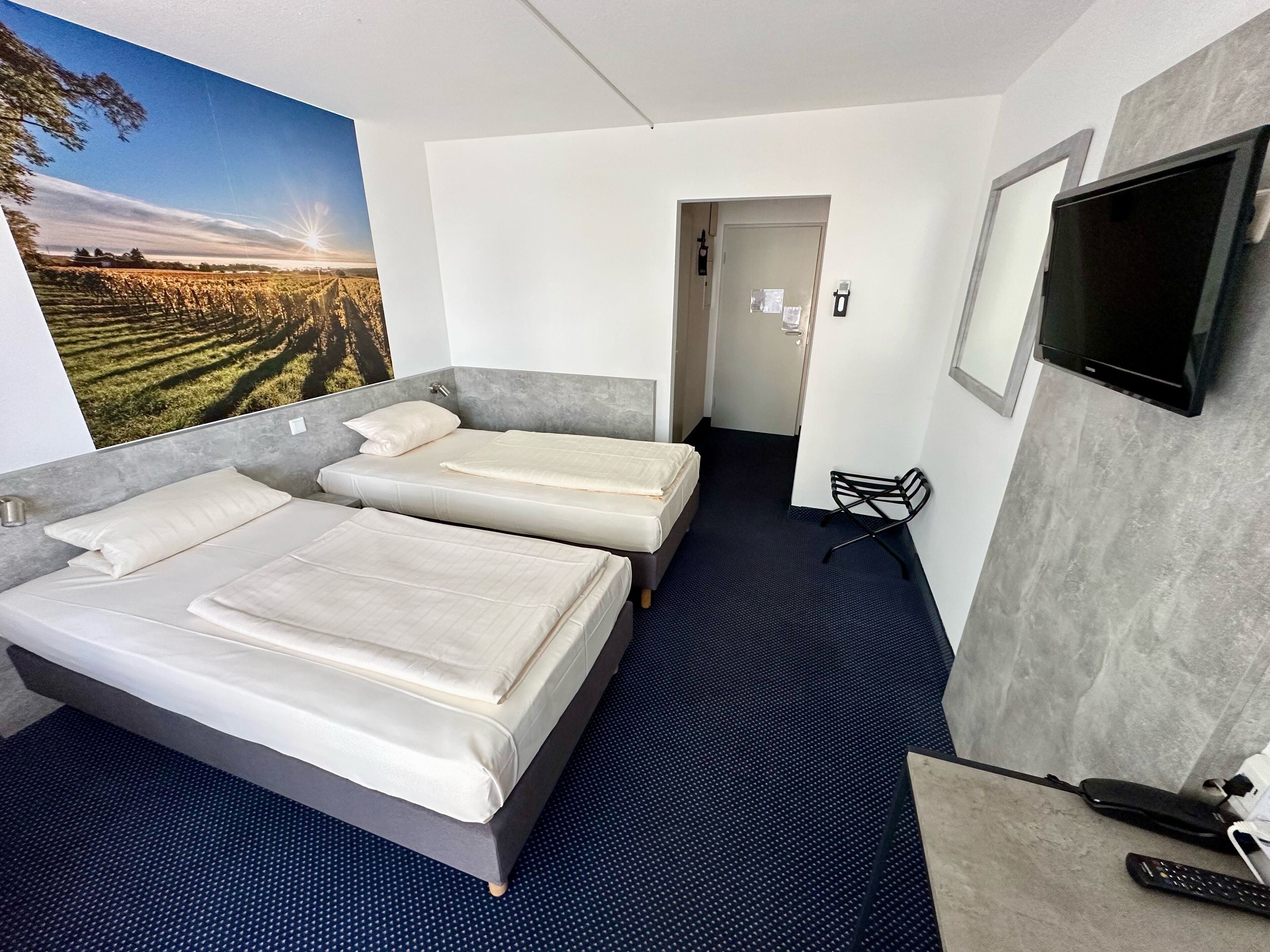 economy twin room | 1 bedroom, in-room safe, desk, blackout curtains