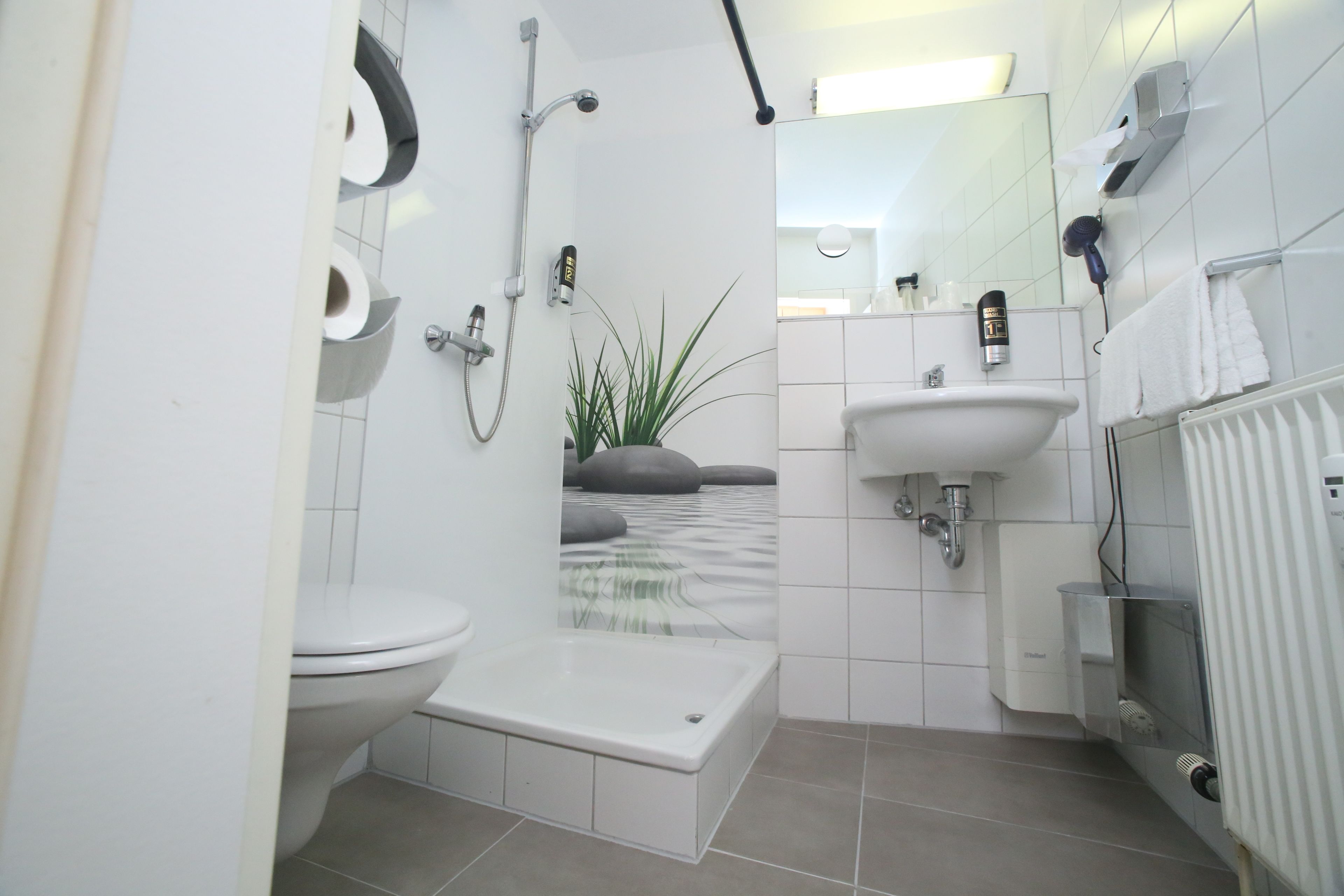 shower, free toiletries, hair dryer, towels