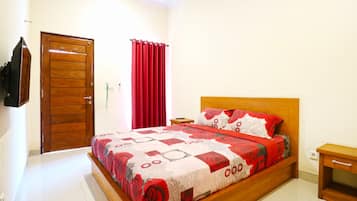 Habitación Deluxe, 1 habitación | Escritorio y ropa de cama