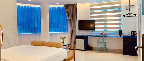 Suite, City View | Minibar, in-room safe, desk, soundproofing