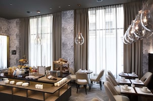 Daily buffet breakfast (CHF 27 per person)