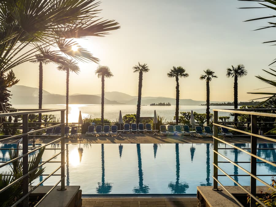 Outdoor pool, open 8:00 AM to 7:00 PM, pool umbrellas, pool loungers