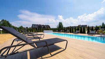 Indoor pool, open noon to 10:00 PM, free pool cabanas, pool loungers