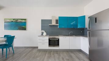 Comfort Villa, 3 Bedrooms | Private kitchen | Full-sized fridge, oven, stovetop, dishwasher