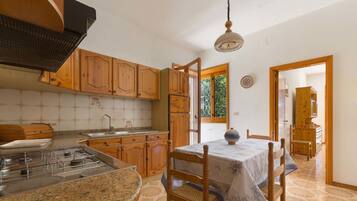 Standard House, 2 Bedrooms | Private kitchen | Full-sized fridge, oven, stovetop, cookware/dishes/utensils