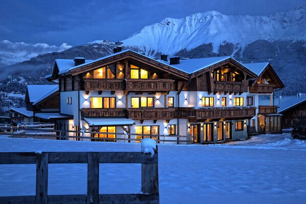 Front of property - evening/night - Alpinium (Fiss)