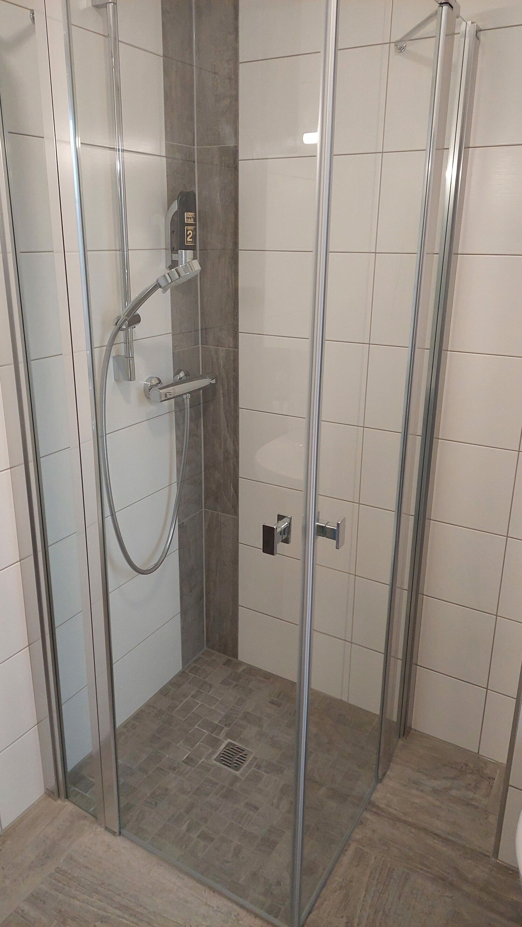 double or twin room | bathroom | shower, hair dryer, towels, soap